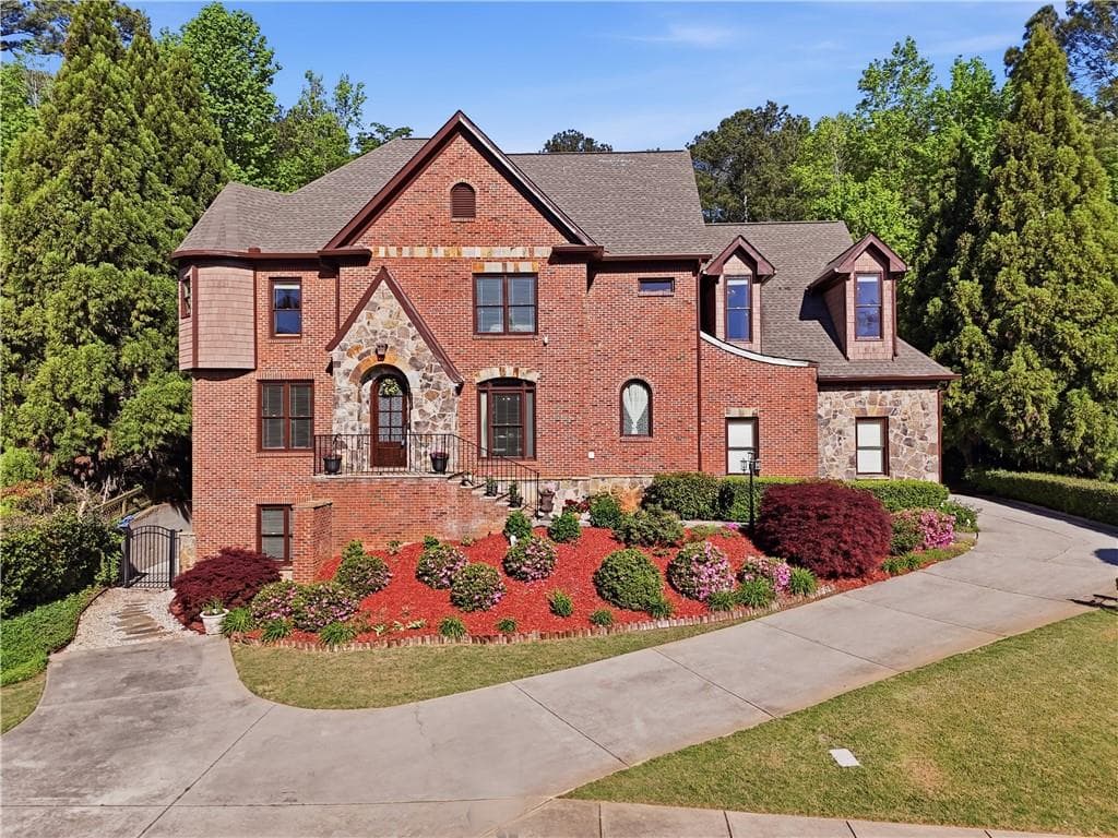 6 bedroom, 5 bathroom, 7,122 sq ft single family residence sold at 3272 Heathchase Lane, Suwanee, GA 30024