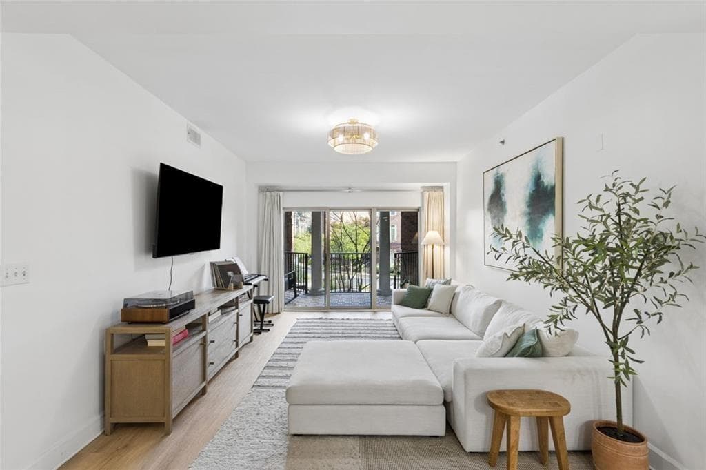 2 bedroom, 2 bathroom, 1,310 sq ft condominium sold at 200 River Vista Drive 311, Atlanta, GA 30339