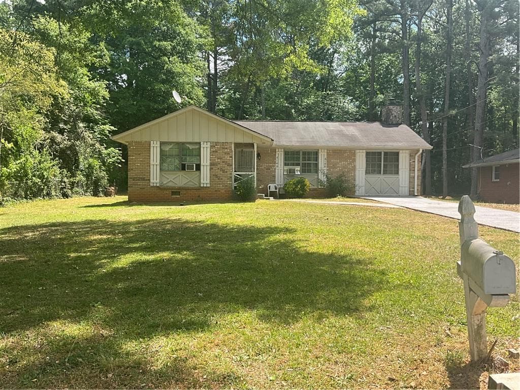 3 bedroom, 2 bathroom, 1,068 sq ft single family residence for sale at 6146 Hickory Drive, Forest Park, GA 30297