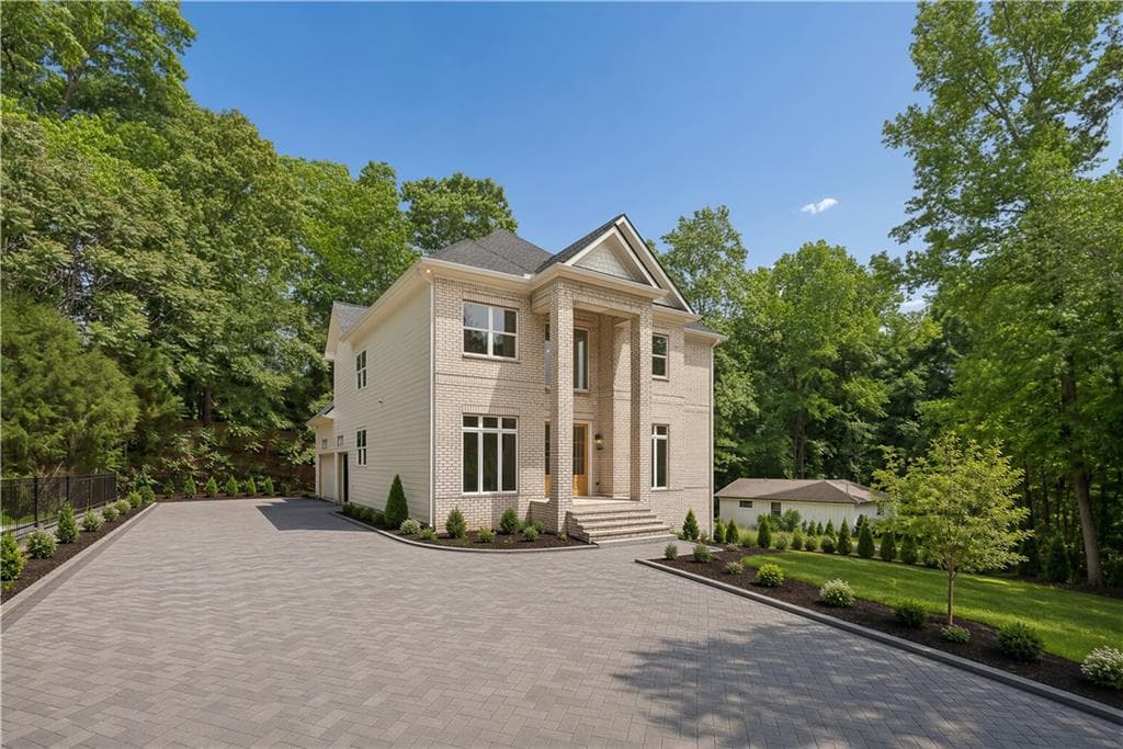5 bedroom, 4 bathroom, 3,851 sq ft single family residence for sale at 10745 Waters Road, Alpharetta, GA 30022
