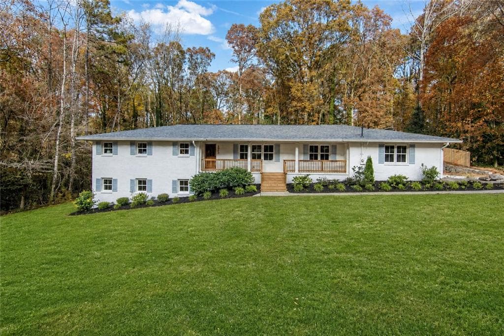 7 bedroom, 5 bathroom, 5,629 sq ft single family residence sold at 4956 Mountclaire Road, Stone Mountain, GA 30087