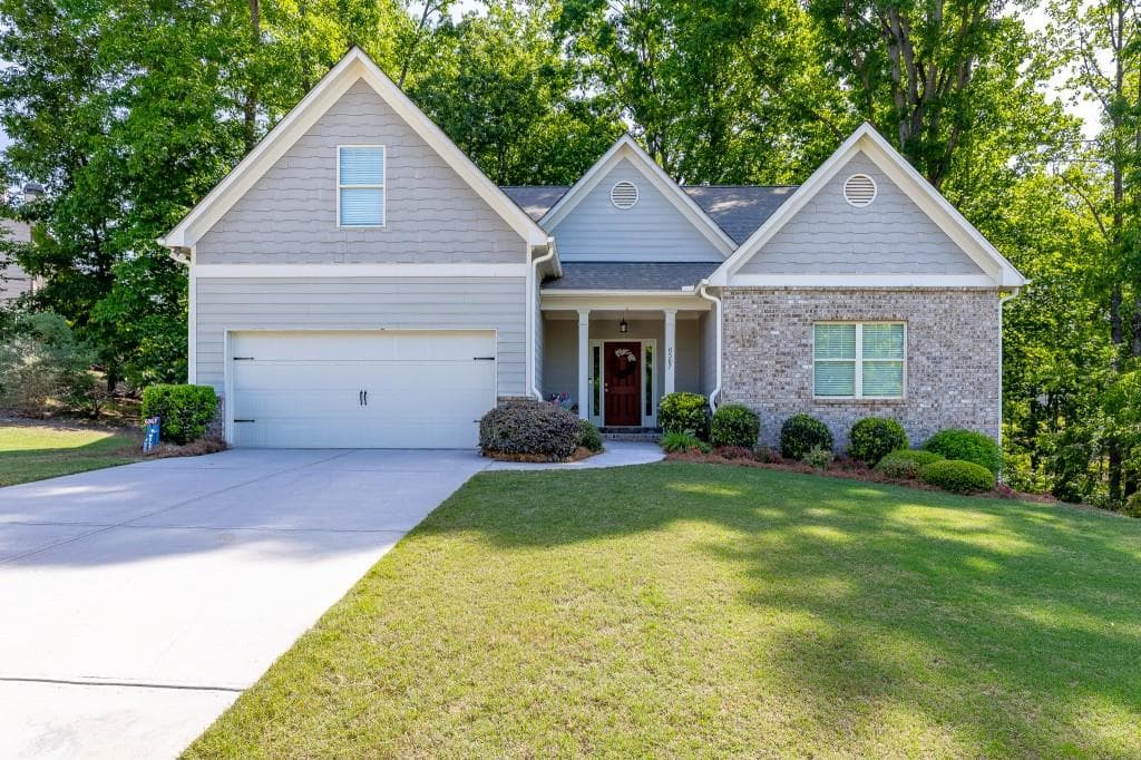 5 bedroom, 4 bathroom, 4,242 sq ft single family residence sold at 6567 Teal Trail Drive, Flowery Branch, GA 30542