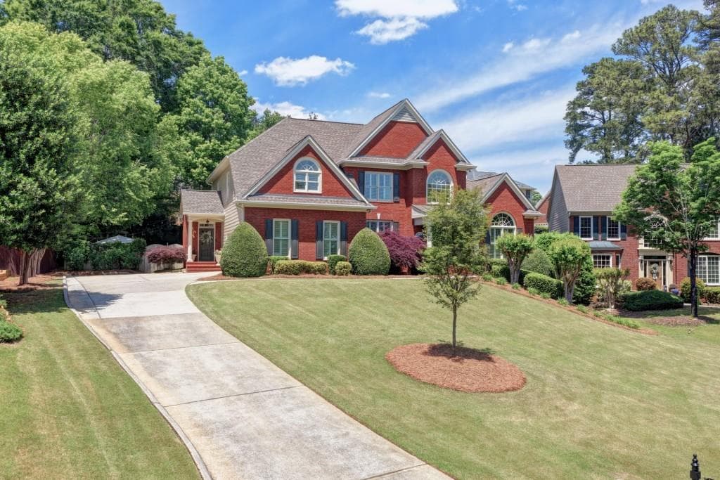 5 bedroom, 5 bathroom, 4,986 sq ft single family residence sold at 1345 Chattahoochee Run Drive, Suwanee, GA 30024