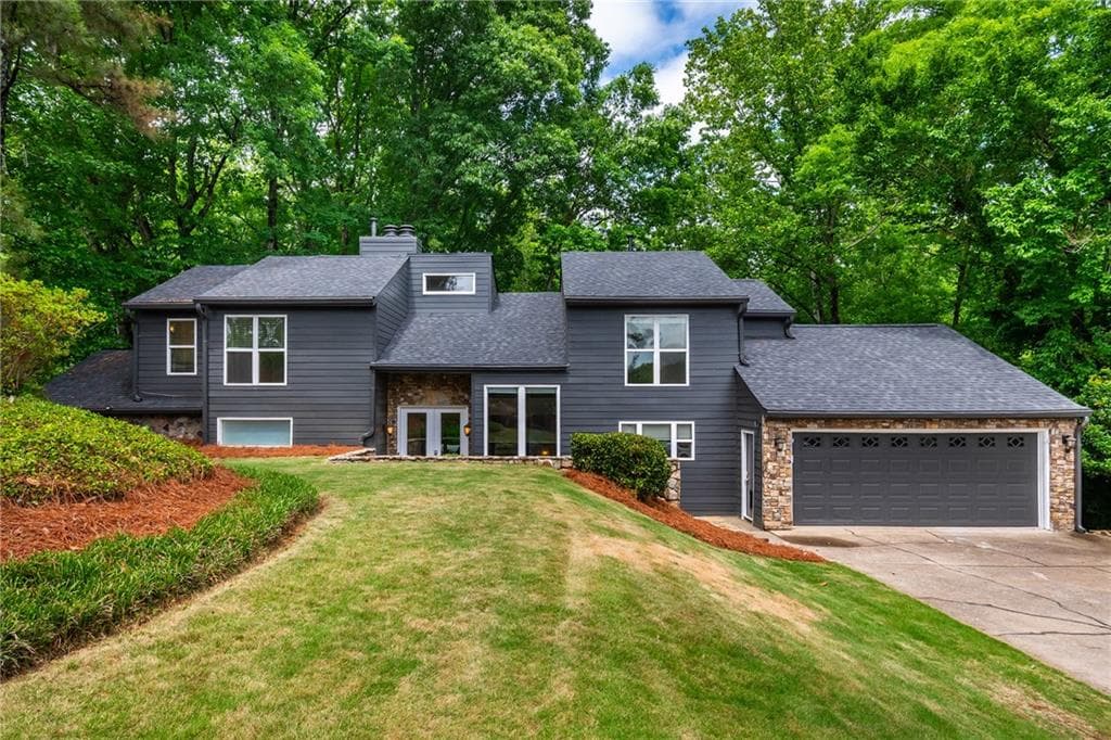 5 bedroom, 5 bathroom, 4,664 sq ft single family residence sold at 884 Oakhaven Drive, Roswell, GA 30075