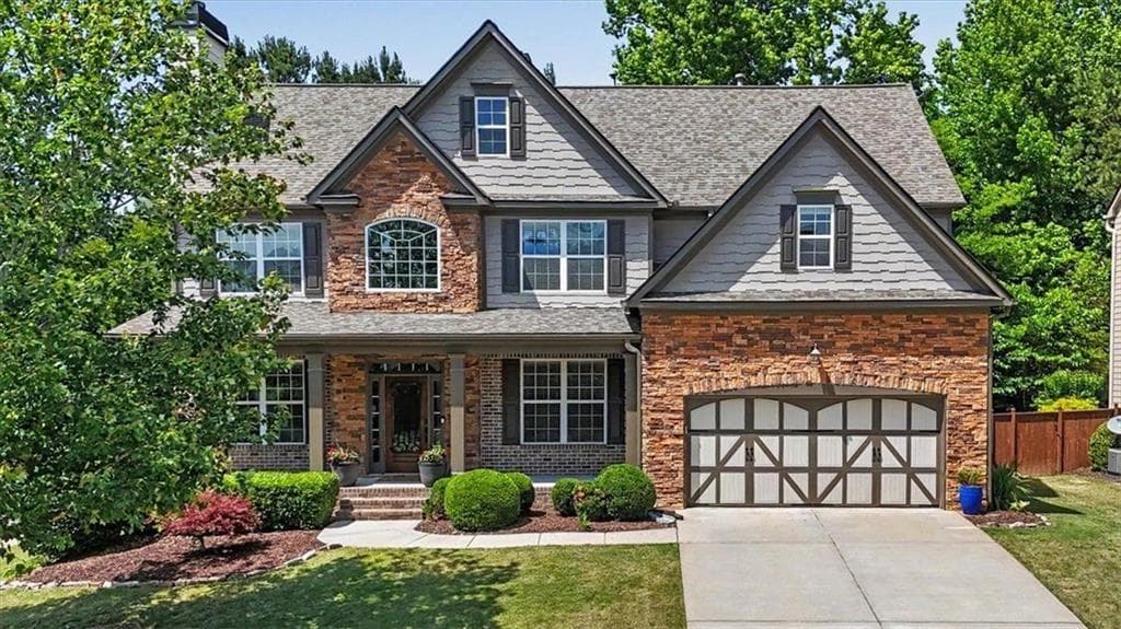 7 bedroom, 5 bathroom, 5,023 sq ft single family residence sold at 122 Lakestone Parkway, Woodstock, GA 30188