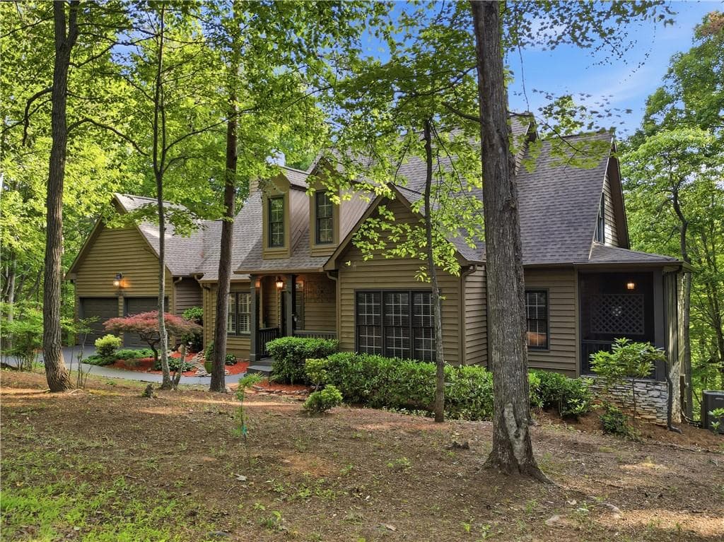 4 bedroom, 4 bathroom, 3,074 sq ft single family residence sold at 122 Woodstream Point, Big Canoe, GA 30143