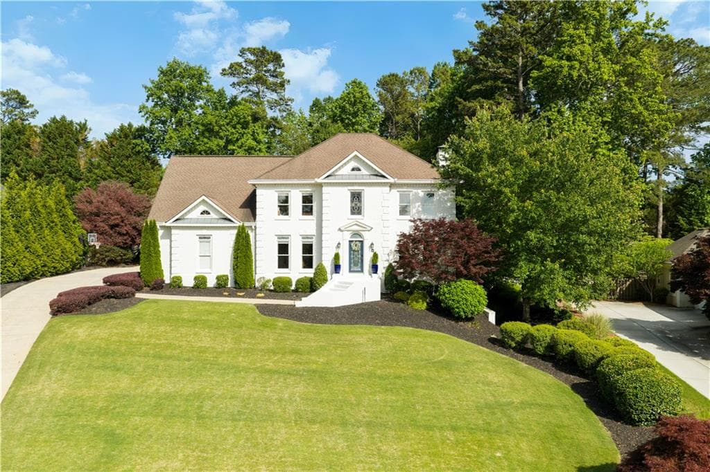 5 bedroom, 6 bathroom, 5,321 sq ft single family residence sold at 6930 Oak Brook Way, Cumming, GA 30040