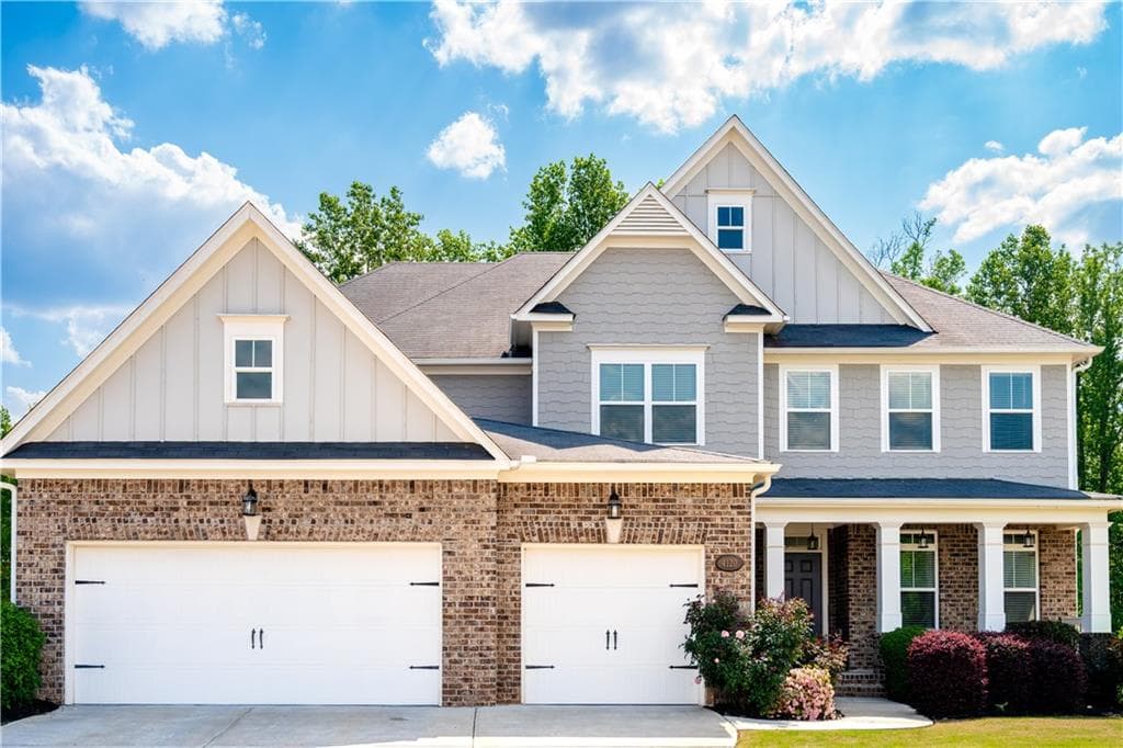 6 bedroom, 5 bathroom, 5,441 sq ft single family residence sold at 4120 Woodwind Drive, Cumming, GA 30028