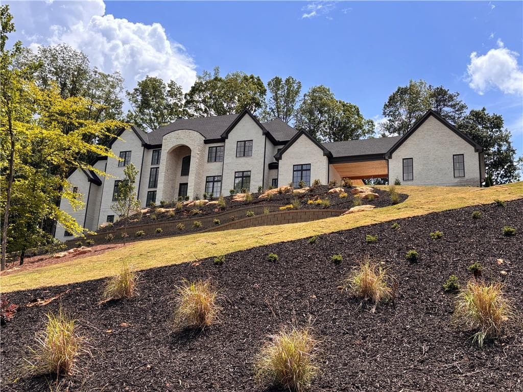 6 bedroom, 9 bathroom, 12,078 sq ft single family residence for sale at 238 Traditions Drive, Alpharetta, GA 30004