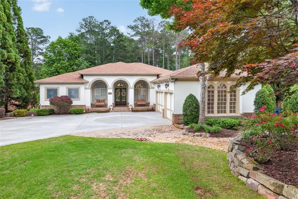 5 bedroom, 5 bathroom, 6,882 sq ft single family residence for sale at 6010 Robbs Drive, Cumming, GA 30041