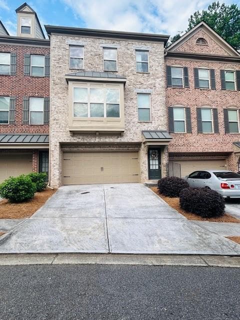 3 bedroom, 4 bathroom, 2,310 sq ft townhouse for sale at 2925 Camplay Drive, Suwanee, GA 30024
