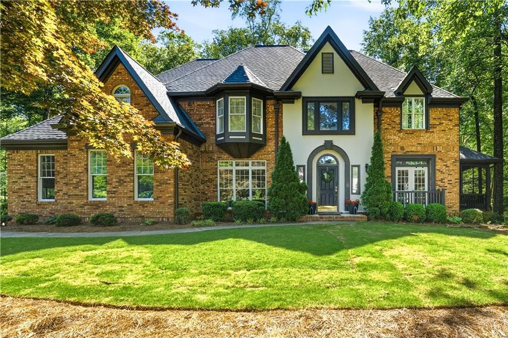 4 bedroom, 5 bathroom, 5,878 sq ft single family residence sold at 1136 Mossy Rock Road, Kennesaw, GA 30152