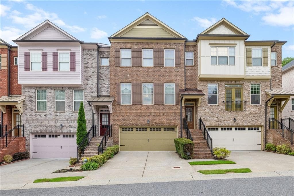 4 bedroom, 4 bathroom, 2,624 sq ft townhouse for sale at 9009 Woodland Trail, Alpharetta, GA 30009