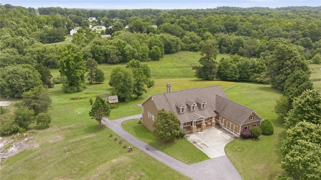 5 bedroom, 4 bathroom, 3,996 sq ft single family residence for sale at 1173 Dee Kennedy Road, Auburn, GA 30011