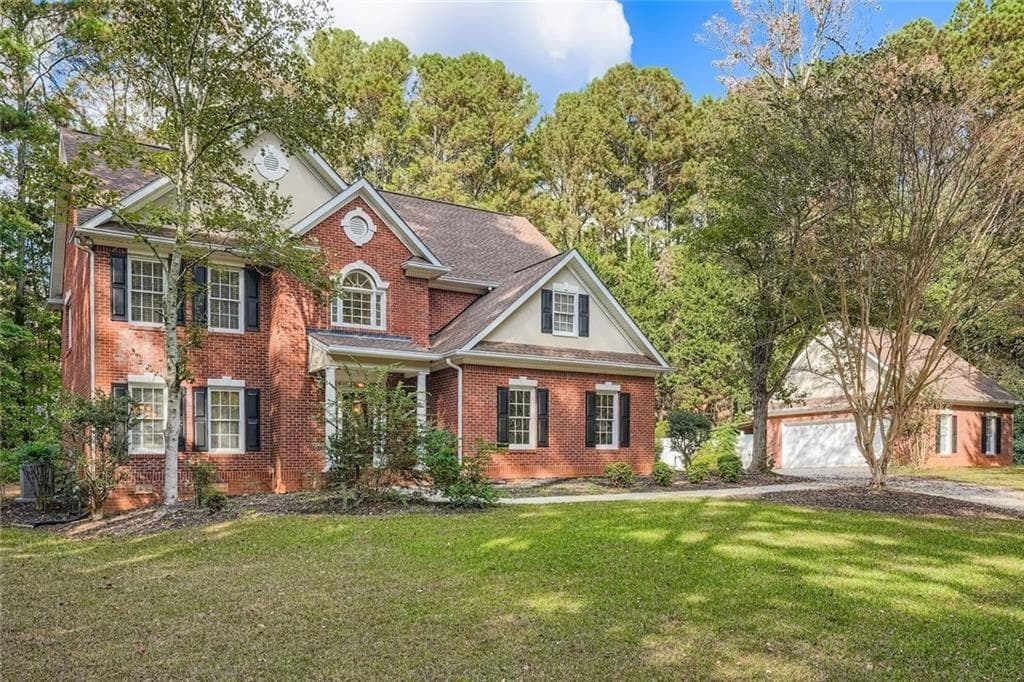 4 bedroom, 3 bathroom, 2,824 sq ft single family residence for sale at 100 Hamilton Glen Court, Fayetteville, GA 30215