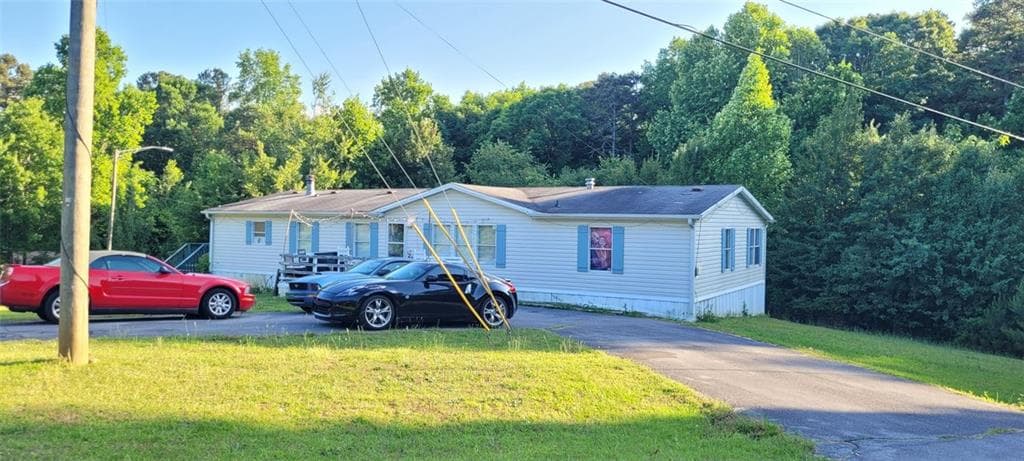 4 bedroom, 2 bathroom, 2,112 sq ft single family residence sold at 7053 Westwood Lane, Acworth, GA 30102
