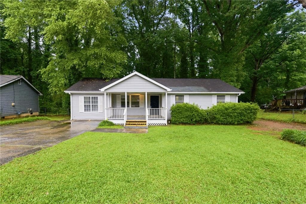 3 bedroom, 2 bathroom, 1,128 sq ft single family residence sold at 8238 Dunellen Lane, Jonesboro, GA 30238