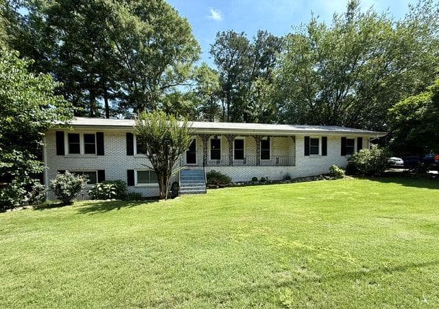 3 bedroom, 2 bathroom, 3,282 sq ft single family residence sold at 1394 Flat Shoals Road, Conyers, GA 30013