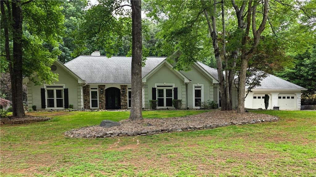 3 bedroom, 2 bathroom, 3,335 sq ft single family residence sold at 6420 White Oak Drive, Cumming, GA 30040