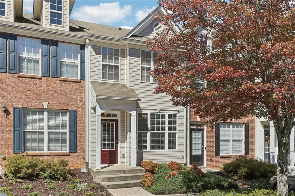 2 bedroom, 3 bathroom, 1,398 sq ft townhouse for sale at 1363 Penhurst Drive, Lawrenceville, GA 30043
