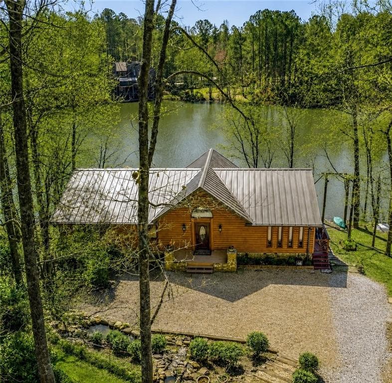 4 bedroom, 3 bathroom, 3,114 sq ft single family residence for sale at 555 Rainbow Lake Drive, Dawsonville, GA 30534