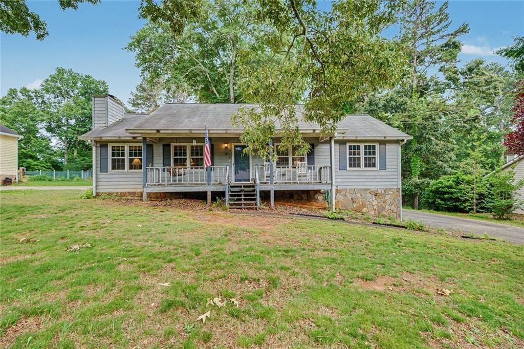 3 bedroom, 2 bathroom, 1,456 sq ft single family residence sold at 313 West Lane, Woodstock, GA 30188