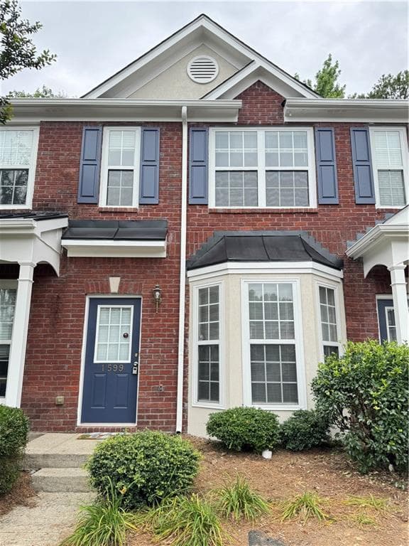 2 bedroom, 3 bathroom, 1,228 sq ft townhouse for sale at 1599 Cove Creek Circle, Norcross, GA 30093
