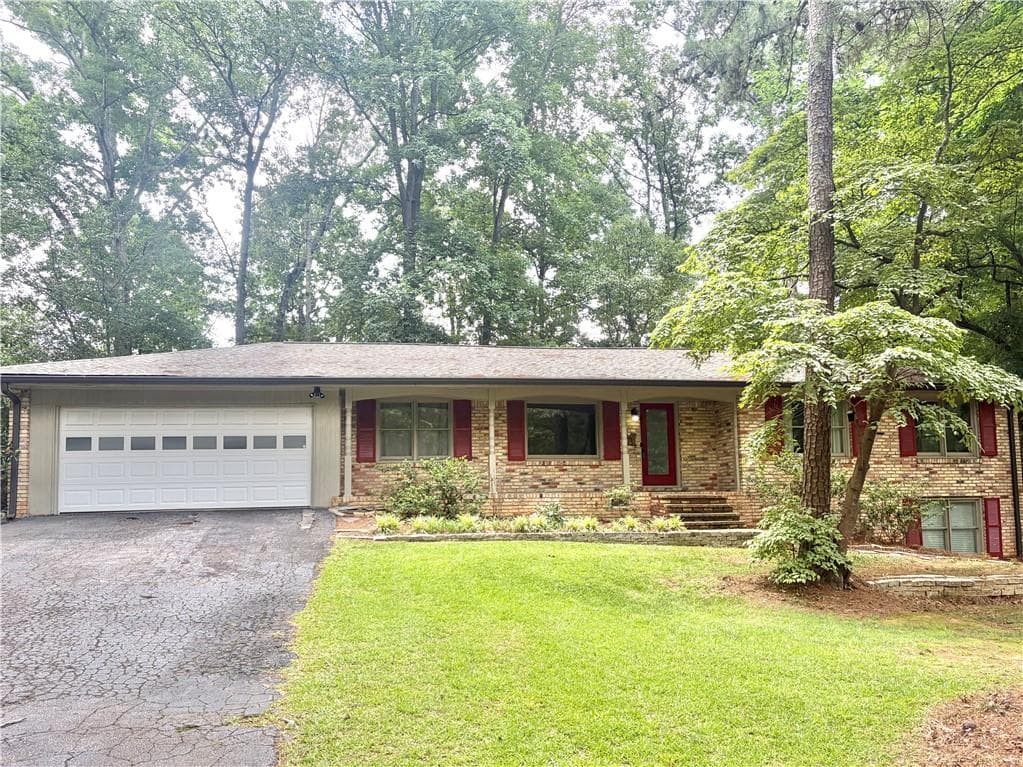 4 bedroom, 3 bathroom, 1,666 sq ft single family residence sold at 5580 Leather Stocking Lane, Smoke Rise, GA 30087