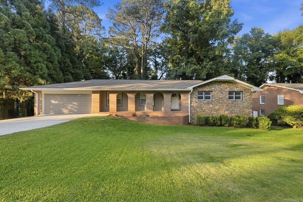 4 bedroom, 3 bathroom, 2,990 sq ft single family residence sold at 2042 Lake Lucerne Drive, Lilburn, GA 30047