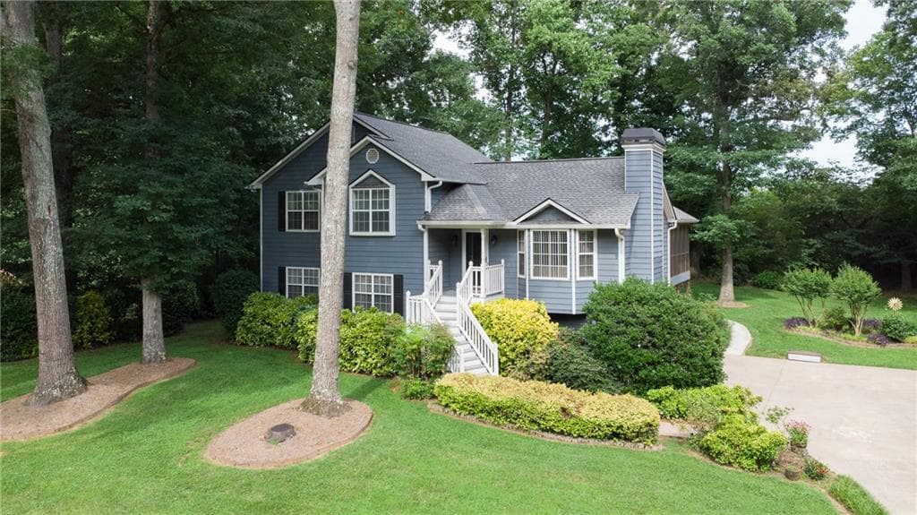 4 bedroom, 3 bathroom, 2,140 sq ft single family residence sold at 6580 Remington Drive, Cumming, GA 30040