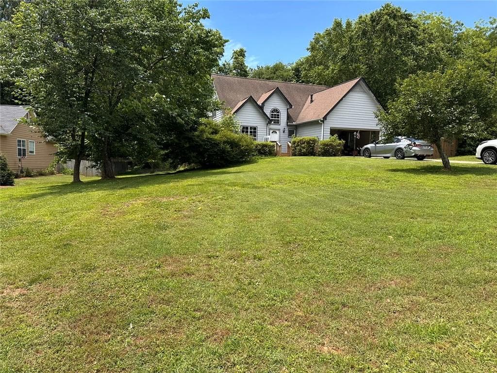 3 bedroom, 3 bathroom, 1,462 sq ft single family residence under contract at 7710 Silversmith Drive, Cumming, GA 30028