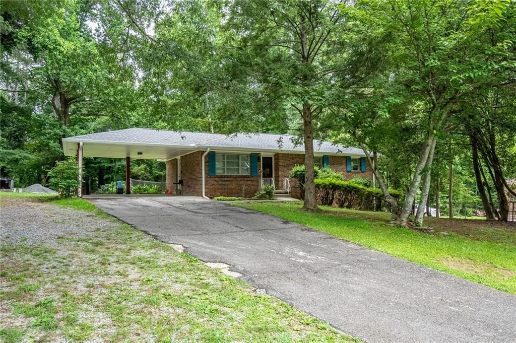 4 bedroom, 3 bathroom, 2,052 sq ft single family residence for sale at 3430 Hillbrook Court, Marietta, GA 30008