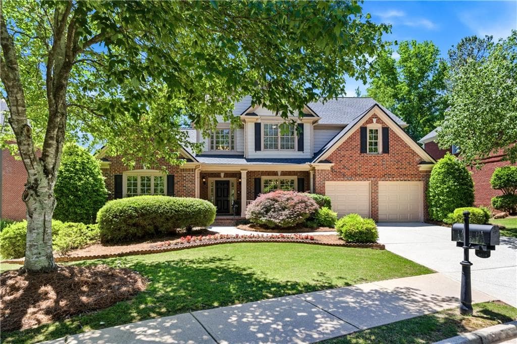 4 bedroom, 5 bathroom, 4,992 sq ft single family residence sold at 8001 Allerton Lane, Cumming, GA 30041