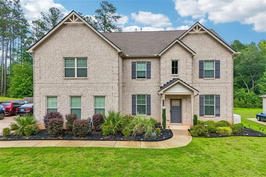 5 bedroom, 4 bathroom, 3,848 sq ft single family residence for sale at 415 Traditions Lane, Hampton, GA 30228