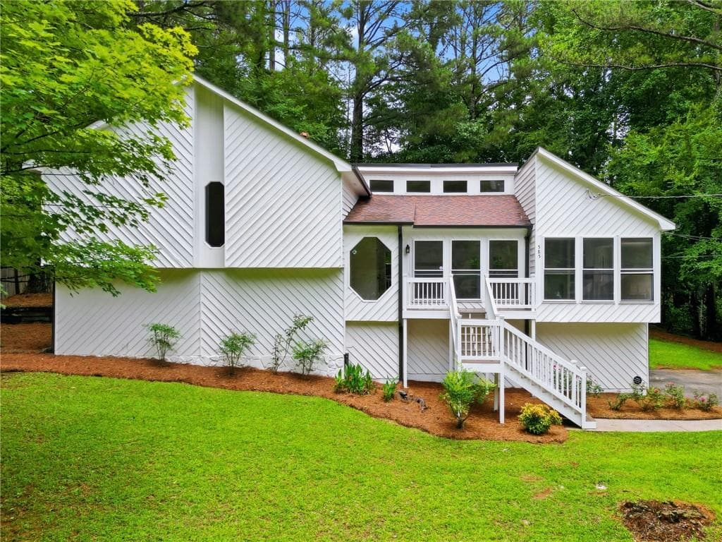 4 bedroom, 3 bathroom, 2,309 sq ft single family residence sold at 585 Rivercrest Drive, Woodstock, GA 30188
