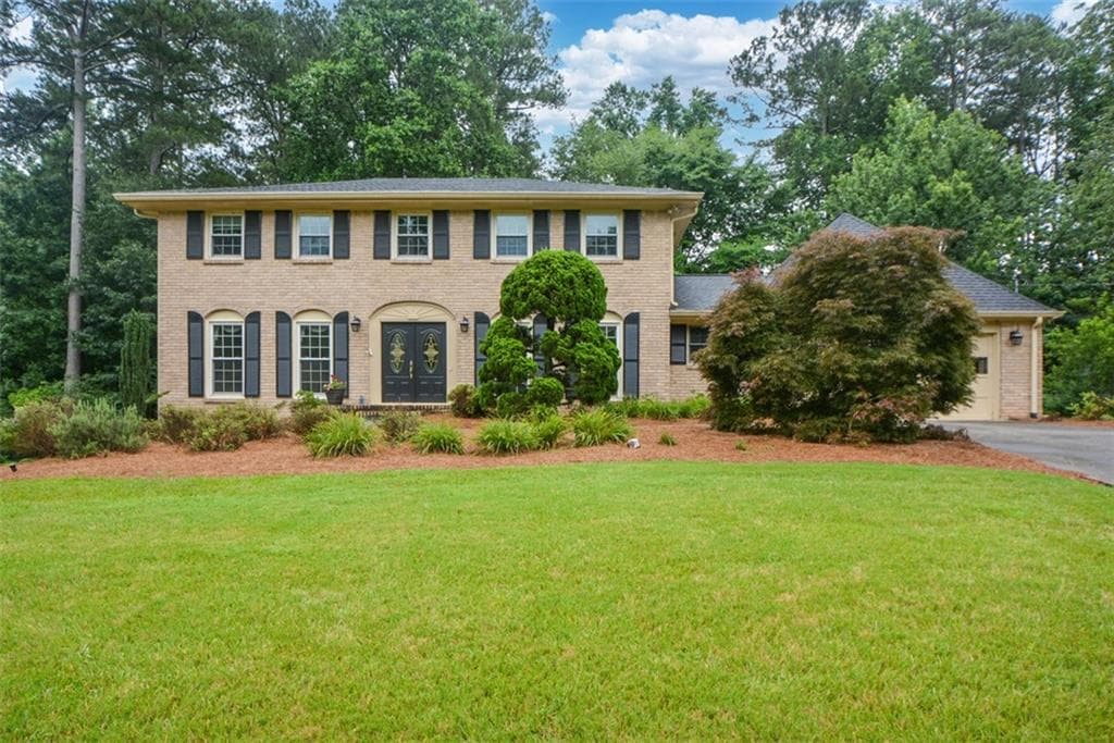 4 bedroom, 3 bathroom, 3,815 sq ft single family residence for sale at 2355 N Peachtree Way, Dunwoody, GA 30338
