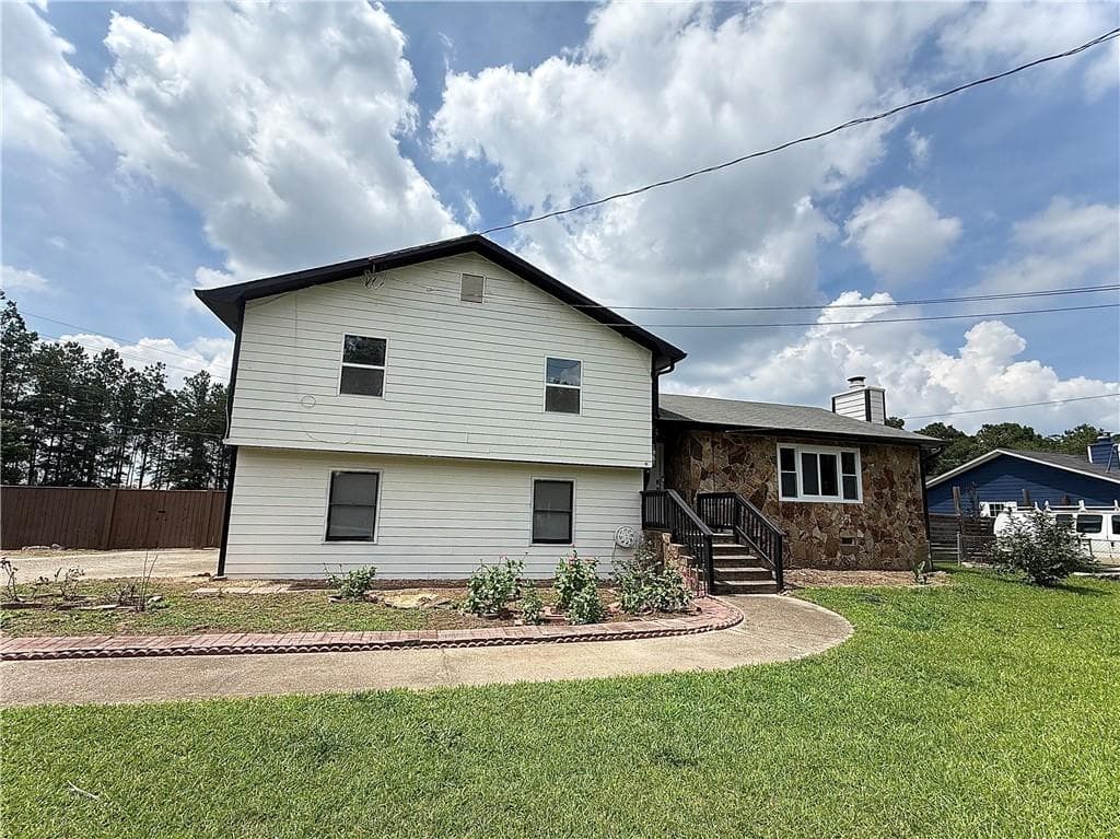 3 bedroom, 2 bathroom, 31,363 sq ft single family residence for sale at 1861 Pharr Road, Snellville, GA 30078