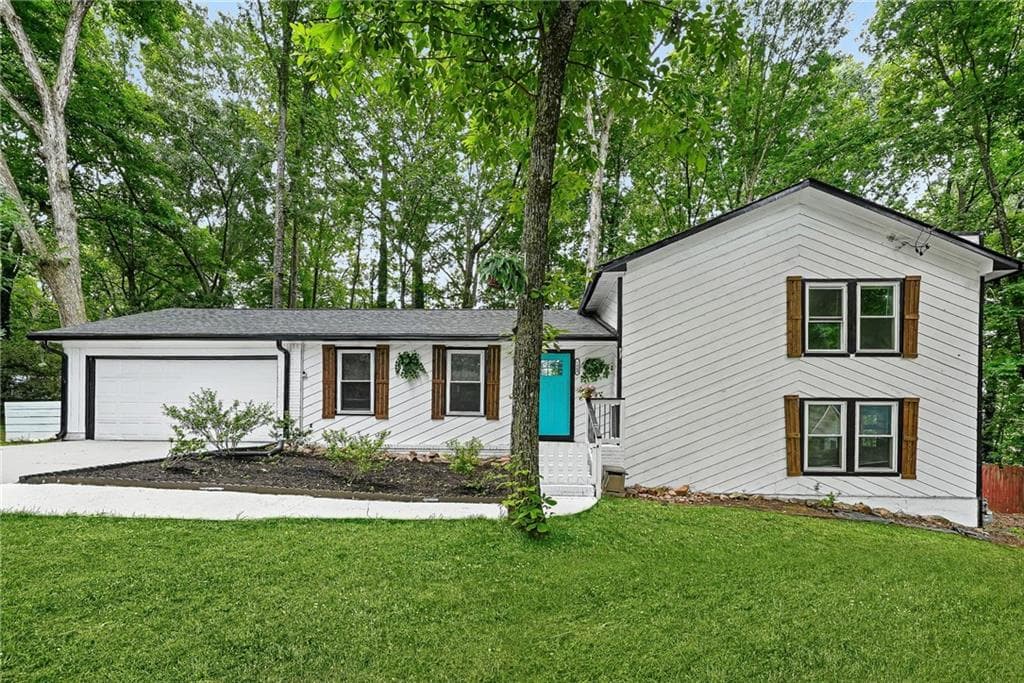 4 bedroom, 3 bathroom, 1,966 sq ft single family residence for sale at 1469 W Rock Court, Stone Mountain, GA 30088