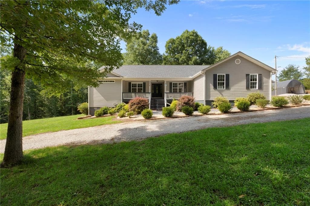 4 bedroom, 2 bathroom, 2,612 sq ft single family residence for sale at 2502 Flat Shoals Road, Conyers, GA 30094