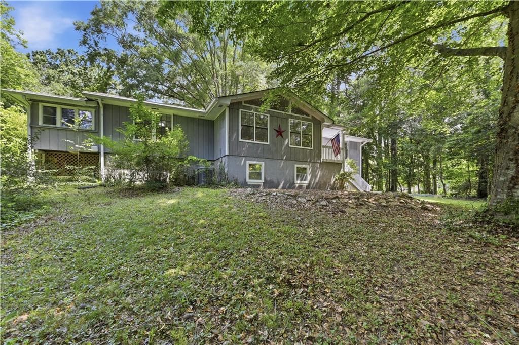 4 bedroom, 3 bathroom, 2,586 sq ft single family residence sold at 1988 Elmwood Circle, Snellville, GA 30078