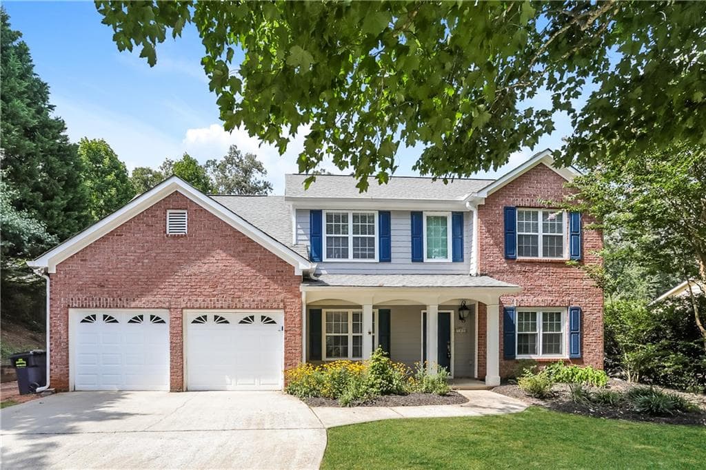 4 bedroom, 3 bathroom, 2,636 sq ft single family residence for sale at 7340 Lanier Cove Court, Cumming, GA 30041