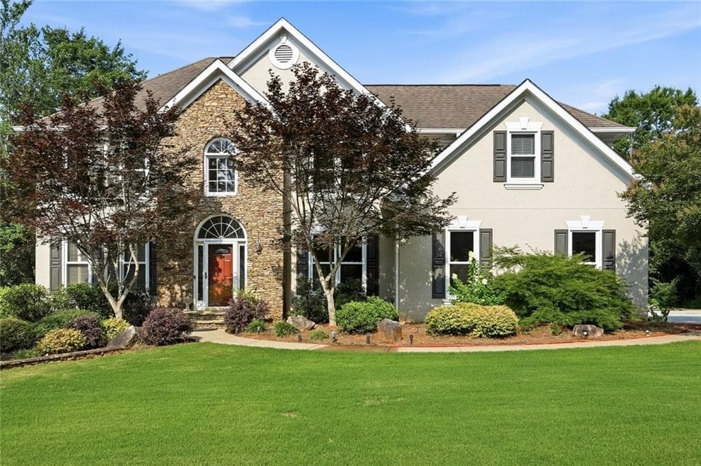 5 bedroom, 4 bathroom, 5,200 sq ft single family residence for sale at 2332 Merrymount Drive, Suwanee, GA 30024