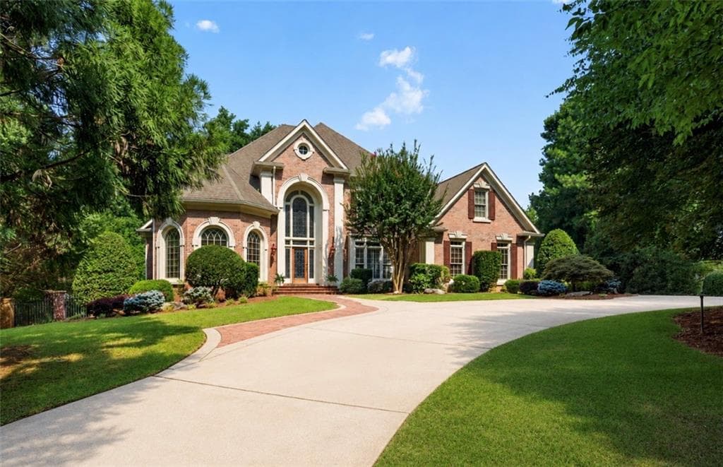 5 bedroom, 6 bathroom, 8,741 sq ft single family residence sold at 2115 Sugarloaf Club Drive, Duluth, GA 30097