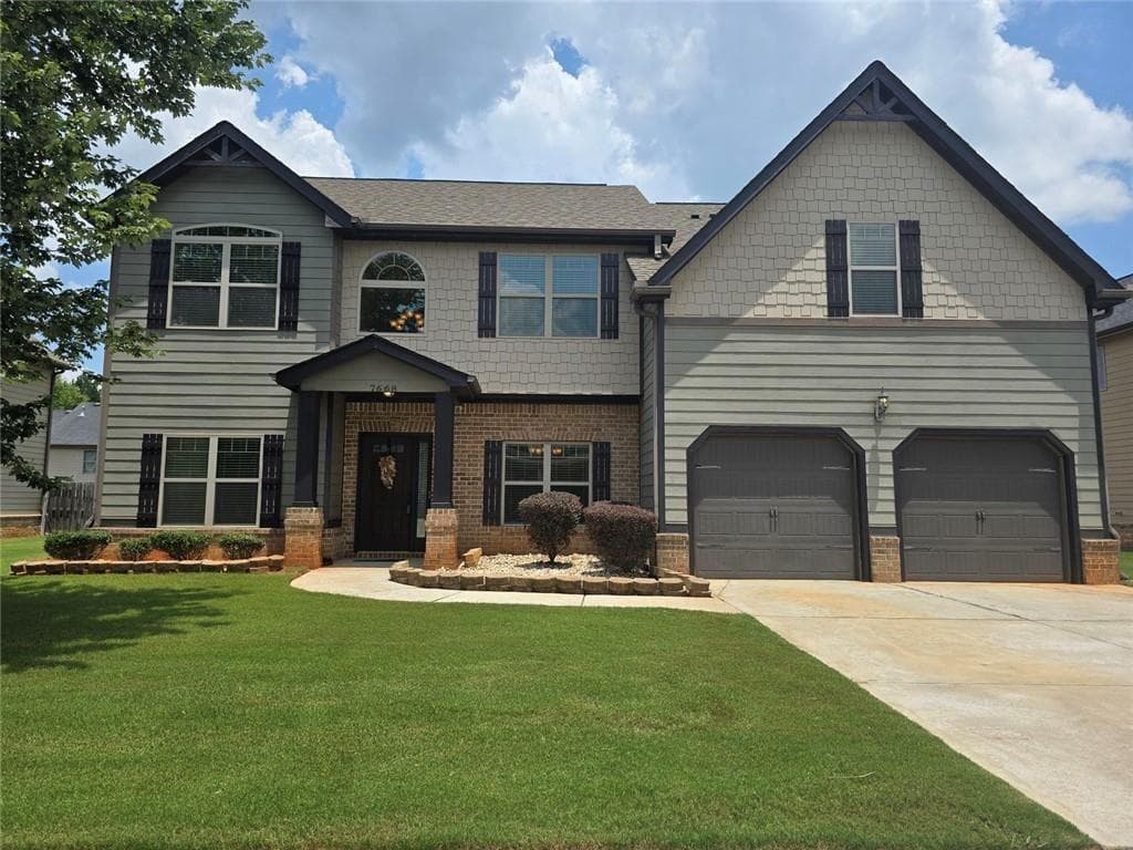 5 bedroom, 4 bathroom, 3,780 sq ft single family residence sold at 7668 Wild Cherry Lane, Stonecrest, GA 30038