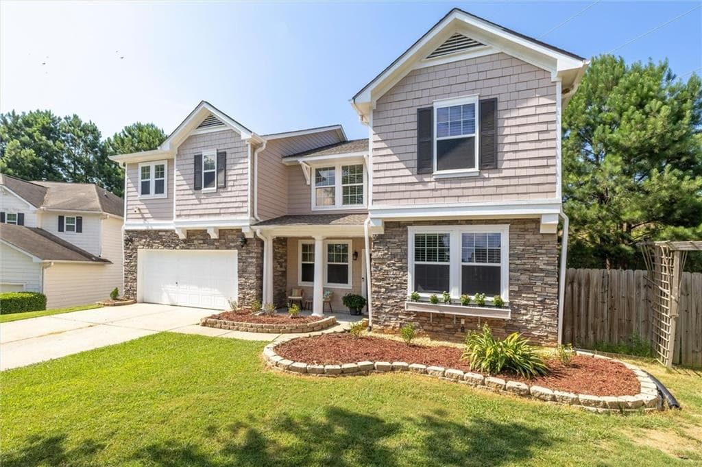 4 bedroom, 3 bathroom, 3,457 sq ft single family residence for sale at 6261 Sparkling Cove Lane, Buford, GA 30518