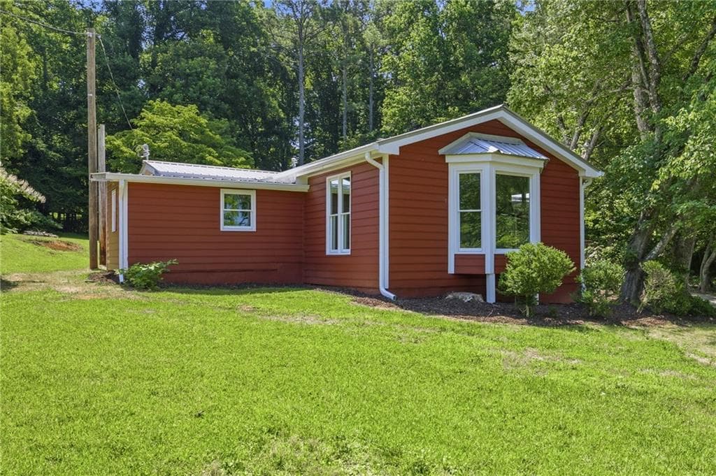 4 bedroom, 2 bathroom, 1,516 sq ft single family residence sold at 89 Thelmas Way, Dawsonville, GA 30534