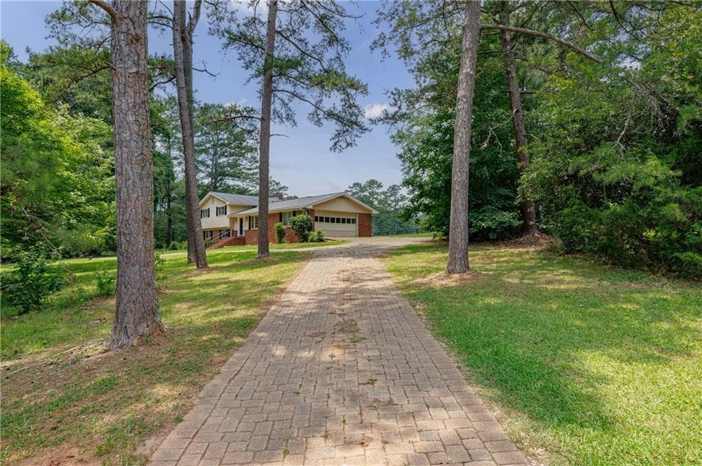 5 bedroom, 3 bathroom, 2,452 sq ft single family residence for sale at 115 Brookshire Drive, Fayetteville, GA 30215