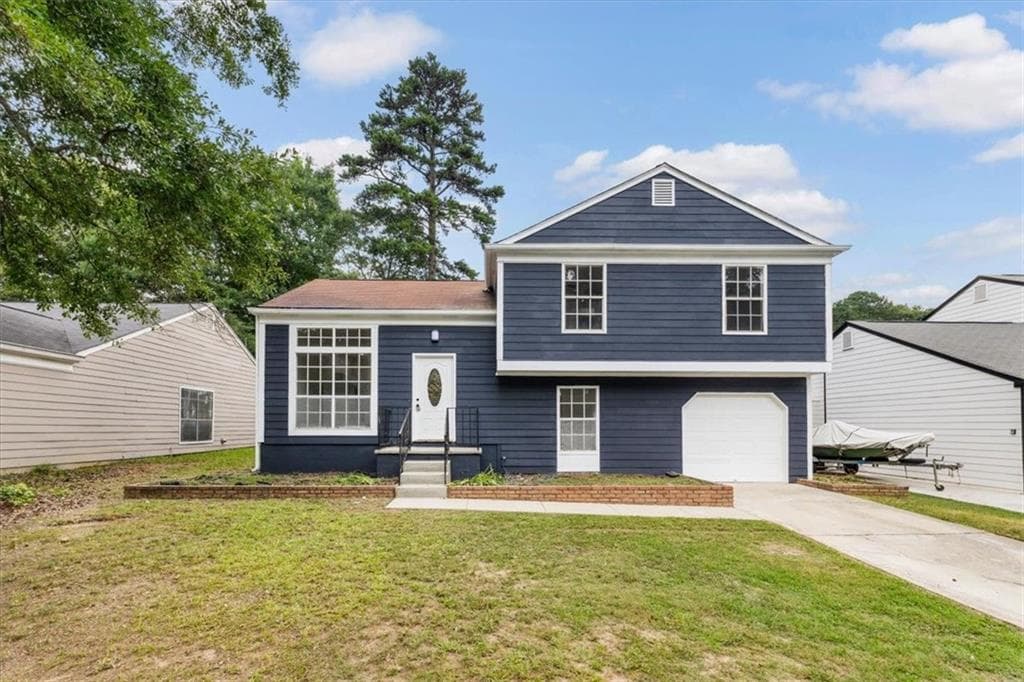 4 bedroom, 3 bathroom, 1,750 sq ft single family residence for sale at 6653 Eastbriar Drive, Lithonia, GA 30058