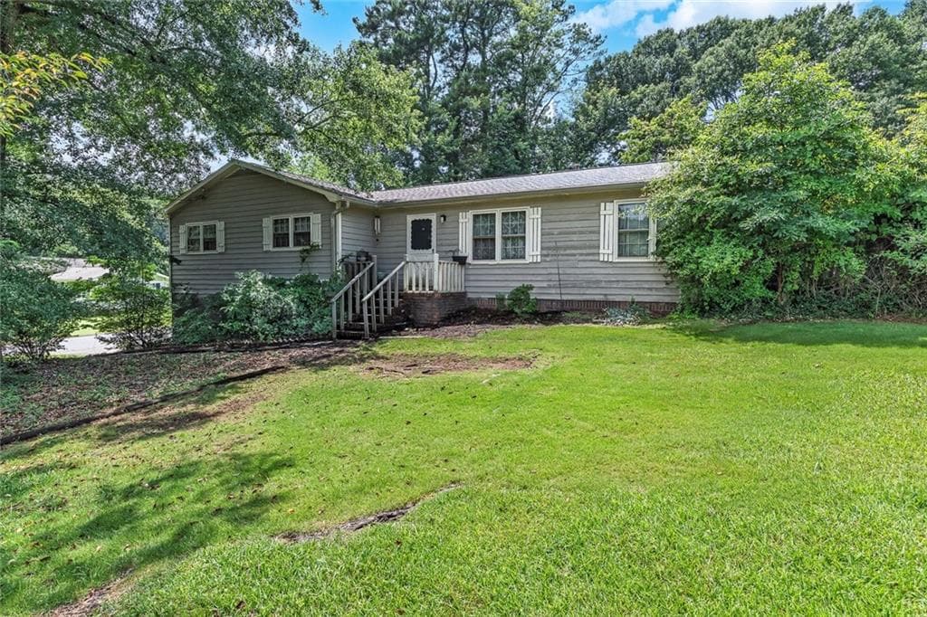 3 bedroom, 2 bathroom, 1,487 sq ft single family residence sold at 233 Foothill Drive, Woodstock, GA 30188