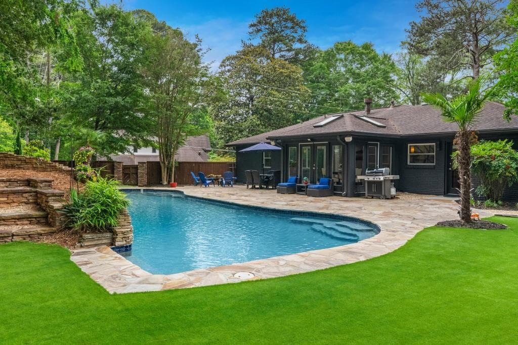 4 bedroom, 3 bathroom single family residence sold at 1975 Lenox Road, Atlanta, GA 30306